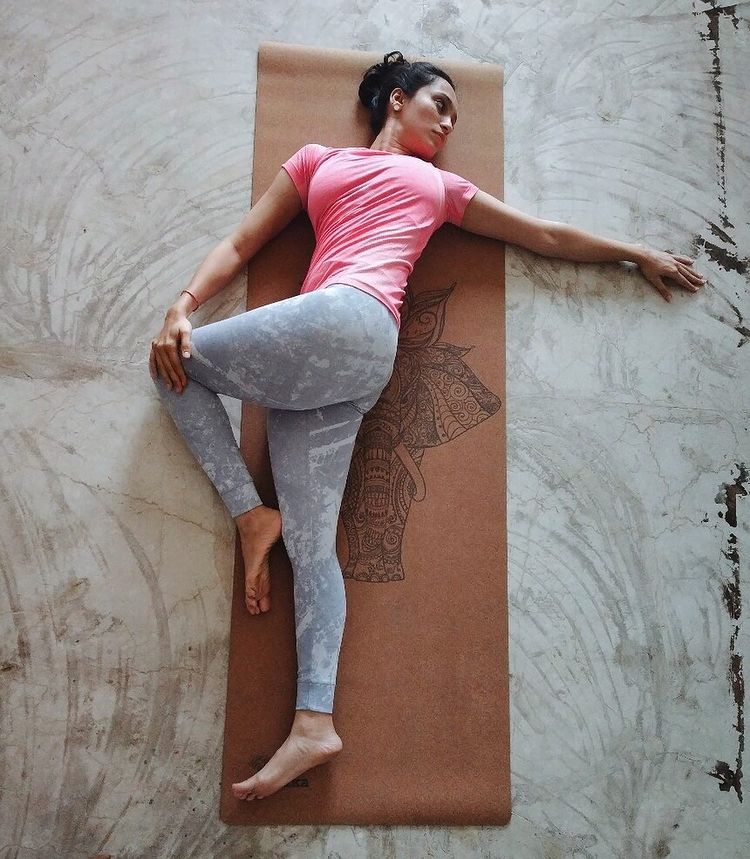 Supta Matsyendrasana (Supine Spinal Twist) yoga - sharp muscle