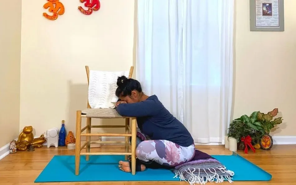 Supported Crossed-Legs Pose (Supported Cross Legged Forward Fold Pose) - Sharp Muscle